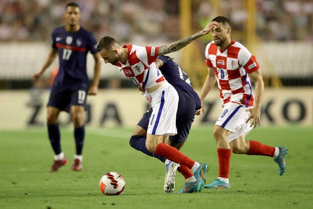 Croatia v France: UEFA Nations League - League Path Group 1 SPLIT, CROATIA - JUNE 06: Christopher Nkunku of France competes for a ball with Marcelo Brozovic of Croatia during the UEFA Nations League League A Group 1 match between Croatia and France at Stadion Poljud on June 6, 2022 in Split, Croatia. IgorxKralj PIXSELL