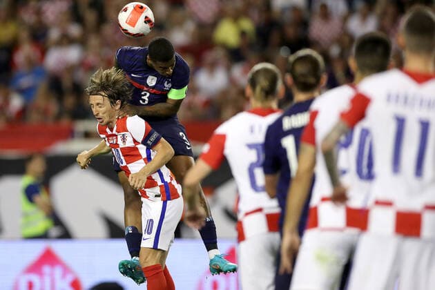 Croatia v France: UEFA Nations League - League Path Group 1 SPLIT, CROATIA - JUNE 06: Luka Modric of Croatia competes for a ball with Presnel Kimpembe of France during the UEFA Nations League League A Group 1 match between Croatia and France at Stadion Poljud on June 6, 2022 in Split, Croatia. IgorxKralj PIXSELL