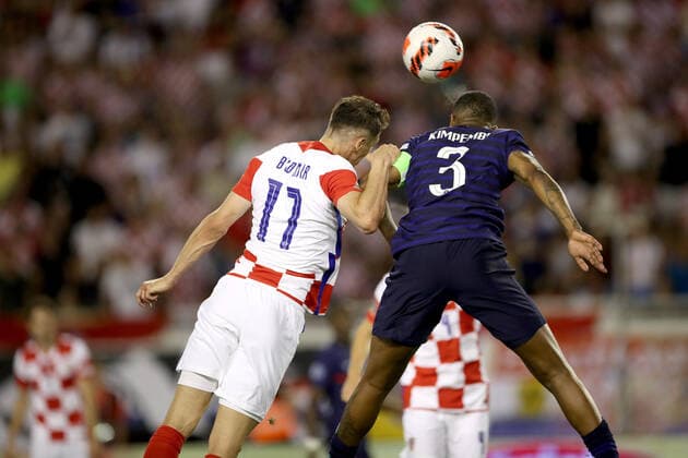 Croatia v France: UEFA Nations League - League Path Group 1 SPLIT, CROATIA - JUNE 06: Ante Budimir of Croatia Presnel Kimpembe of France compete for a ball during the UEFA Nations League League A Group 1 match between Croatia and France at Stadion Poljud on June 6, 2022 in Split, Croatia. IgorxKralj PIXSELL