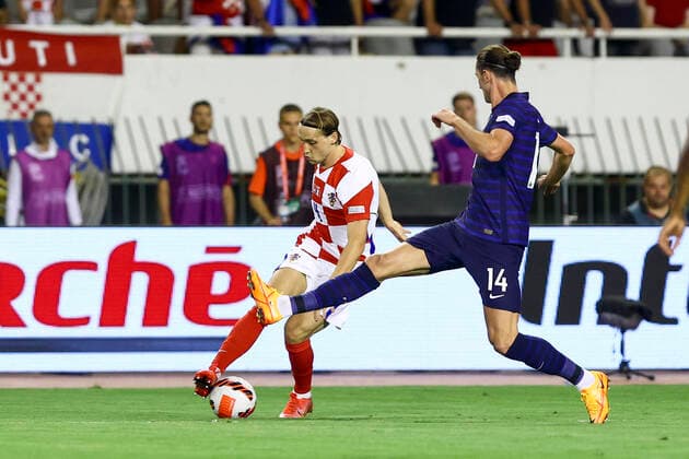 Croatia v France: UEFA Nations League - League Path Group 1 SPLIT, CROATIA - JUNE 06: Lovro Majer of Croatia is challenged by Adrien Rabiot of Franceduring the UEFA Nations League League A Group 1 match between Croatia and France at Stadion Poljud on June 6, 2022 in Split, Croatia. MilanxSabic PIXSELL