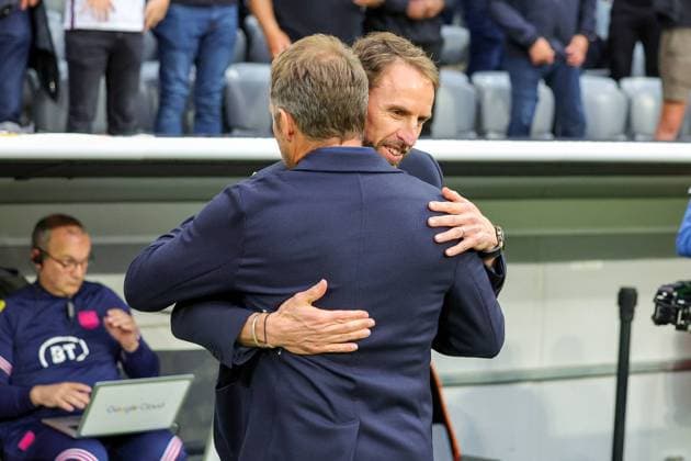 Germany v England UEFA Nations League 07 06 2022. Gareth Southgate Manager of England greets Hansi Flick Manager of Germany during the UEFA Nations League match between Germany and England at Allianz Arena, Munich, Germany on 7 June 2022. Editorial use only , Copyright: xNigelxKeenex PSI-15374-0016