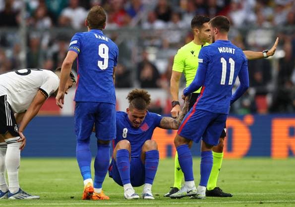 Munich, Germany, 7th June 2022. Kalvin Phillips of England is helped up for the first time from an injury during the UEFA Nations League match at Allianz Arena, Munich. Picture credit should read: David Klein Sportimage EDITORIAL USE ONLY. No use with unauthorised audio, video, data, fixture lists, club league logos or live services. Online in-match use limited to 120 images, no video emulation. No use in betting, games or single club league player publications. SPI-1728-0042