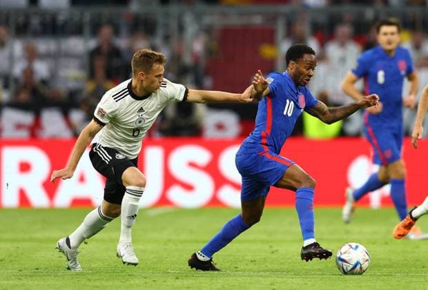 Munich, Germany, 7th June 2022. Joshua Kimmich of Germany closes down Raheem Sterling of England during the UEFA Nations League match at Allianz Arena, Munich. Picture credit should read: David Klein Sportimage EDITORIAL USE ONLY. No use with unauthorised audio, video, data, fixture lists, club league logos or live services. Online in-match use limited to 120 images, no video emulation. No use in betting, games or single club league player publications. SPI-1728-0058