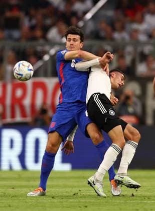 Munich, Germany, 7th June 2022. Harry Maguire of England grapples with Kai Havertz of Germany during the UEFA Nations League match at Allianz Arena, Munich. Picture credit should read: David Klein Sportimage EDITORIAL USE ONLY. No use with unauthorised audio, video, data, fixture lists, club league logos or live services. Online in-match use limited to 120 images, no video emulation. No use in betting, games or single club league player publications. SPI-1728-0064