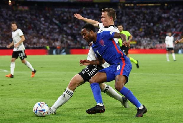 Munich, Germany, 7th June 2022. Raheem Sterling of England tackled by Lukas Klostermann of Germany during the UEFA Nations League match at Allianz Arena, Munich. Picture credit should read: David Klein Sportimage EDITORIAL USE ONLY. No use with unauthorised audio, video, data, fixture lists, club league logos or live services. Online in-match use limited to 120 images, no video emulation. No use in betting, games or single club league player publications. SPI-1728-0065