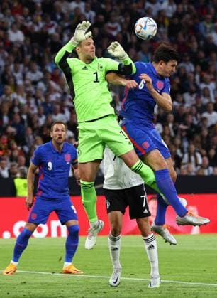 Munich, Germany, 7th June 2022. Harry Maguire of England challenges Manuel Neuer of Germany during the UEFA Nations League match at Allianz Arena, Munich. Picture credit should read: David Klein Sportimage EDITORIAL USE ONLY. No use with unauthorised audio, video, data, fixture lists, club league logos or live services. Online in-match use limited to 120 images, no video emulation. No use in betting, games or single club league player publications. SPI-1728-0066