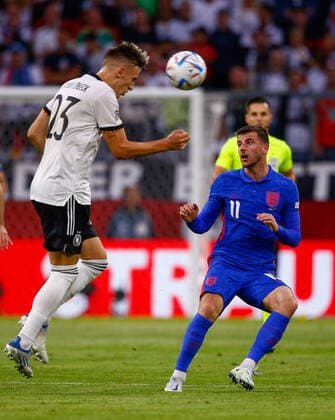 Germany v England UEFA Nations League Nico Schlotterbeck of Germany and Mason Mount of England during the UEFA Nations League match between Germany and England at Allianz Arena, Munich Content Not Available For UK Newspapers Copyright: xPaulxChestertonx FIL-16985-0084 UK Newspapers OUT