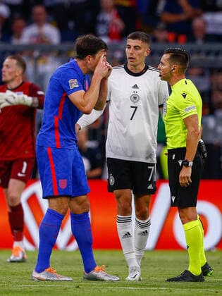 Germany v England UEFA Nations League Harry Maguire of England speaks to the match referee during the UEFA Nations League match between Germany and England at Allianz Arena, Munich Content Not Available For UK Newspapers Copyright: xPaulxChestertonx FIL-16985-0092 UK Newspapers OUT