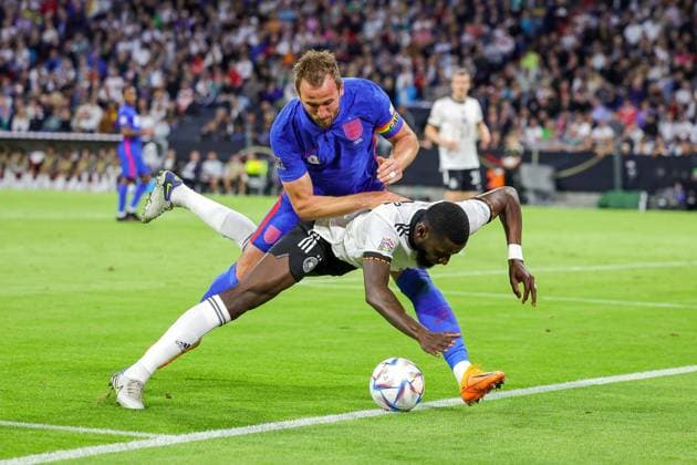 Germany v England UEFA Nations League 07 06 2022. Harry Kane (9) of England tussles with Antonio Rudiger (2) of Germany during the UEFA Nations League match between Germany and England at Allianz Arena, Munich, Germany on 7 June 2022. Editorial use only , Copyright: xNigelxKeenex PSI-15374-0032