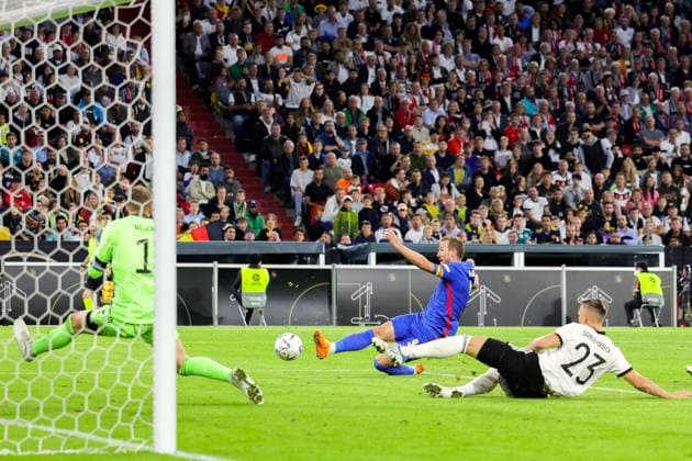 Germany v England UEFA Nations League 07 06 2022. Harry Kane (9) of England shoots towards the goal during the UEFA Nations League match between Germany and England at Allianz Arena, Munich, Germany on 7 June 2022. Editorial use only , Copyright: xNigelxKeenex PSI-15374-0046