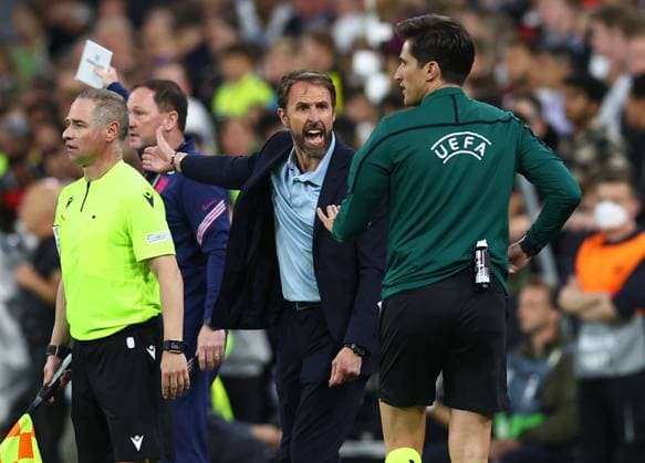 Munich, Germany, 7th June 2022. Gareth Southgate manager of England shows his displeasure at the referee not stoping the game for an injury to Jude Bellingham during the UEFA Nations League match at Allianz Arena, Munich. Picture credit should read: David Klein Sportimage EDITORIAL USE ONLY. No use with unauthorised audio, video, data, fixture lists, club league logos or live services. Online in-match use limited to 120 images, no video emulation. No use in betting, games or single club league player publications. SPI-1728-0107
