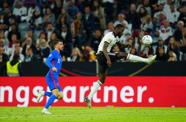 Mandatory Credit: Photo by Javier Garcia Shutterstock (12975315ad) Toni Rudiger of Germany clears under pressure from Mason Mount of England Germany v England, UEFA Nations League, Group C, International Football, Allianz Arena, Munich, Germany - 07 Jun 2022 EDITORIAL USE ONLY No use with unauthorised audio, video, data, fixture lists, club league logos or live services. Online in-match use limited to 120 images, no video emulation. No use in betting, games or single club league player publications. Germany v England, UEFA Nations League, Group C, International Football, Allianz Arena, Munich, Germany - 07 Jun 2022 EDITORIAL USE ONLY No use with unauthorised audio, video, data, fixture lists, club league logos or live services. Online in-match use limited to 120 images, no video emulation. No use in betting, games or single club league player publications. Copyright: xJavierxGarcia Shutterstockx 12975315ad