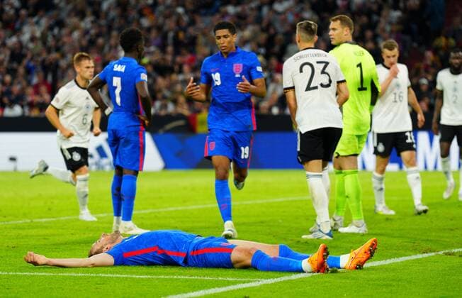 Mandatory Credit: Photo by Javier Garcia Shutterstock (12975315aj) Harry Kane of England reacts after having a shot saved well by Germany goalkeeper Manuel Neuer Germany v England, UEFA Nations League, Group C, International Football, Allianz Arena, Munich, Germany - 07 Jun 2022 EDITORIAL USE ONLY No use with unauthorised audio, video, data, fixture lists, club league logos or live services. Online in-match use limited to 120 images, no video emulation. No use in betting, games or single club league player publications. Germany v England, UEFA Nations League, Group C, International Football, Allianz Arena, Munich, Germany - 07 Jun 2022 EDITORIAL USE ONLY No use with unauthorised audio, video, data, fixture lists, club league logos or live services. Online in-match use limited to 120 images, no video emulation. No use in betting, games or single club league player publications. Copyright: xJavierxGarcia Shutterstockx 12975315aj