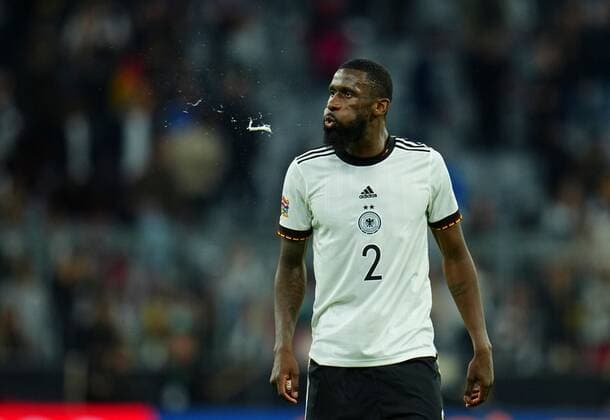 Mandatory Credit: Photo by Javier Garcia Shutterstock (12975315am) Toni Rudiger of Germany spits Germany v England, UEFA Nations League, Group C, International Football, Allianz Arena, Munich, Germany - 07 Jun 2022 EDITORIAL USE ONLY No use with unauthorised audio, video, data, fixture lists, club league logos or live services. Online in-match use limited to 120 images, no video emulation. No use in betting, games or single club league player publications. Germany v England, UEFA Nations League, Group C, International Football, Allianz Arena, Munich, Germany - 07 Jun 2022 EDITORIAL USE ONLY No use with unauthorised audio, video, data, fixture lists, club league logos or live services. Online in-match use limited to 120 images, no video emulation. No use in betting, games or single club league player publications. Copyright: xJavierxGarcia Shutterstockx 12975315am