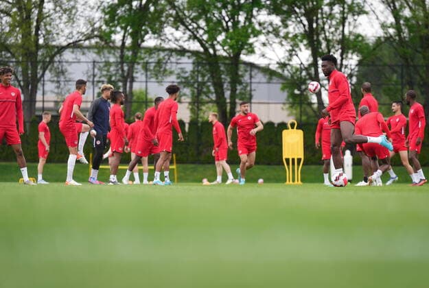 June 7, 2022, VANCOUVER, BC, CANADA: Canadian national men s soccer team forward Alphonso Davies, right, passes the ball during a training session for a CONCACAF Nations League match against Curacao, in Vancouver, on Tuesday, June 7, 2022. Canada s men s soccer team is back to training for the Thursday match, but the players say there s still work to be done on reaching a new deal with the s national governing body. A scheduled friendly against Panama on Sunday was cancelled after the Canadian team refused to play due to a labour dispute. Canada News - June 7, 2022  - ZUMAc35_ 20220607_zaf_c35_092 Copyright: xDarrylxDyckx