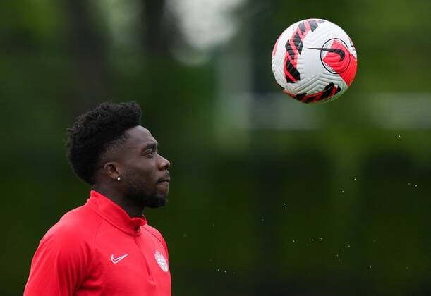 June 7, 2022, VANCOUVER, BC, CANADA: Canadian national men s soccer team forward Alphonso Davies juggles a ball with his feet during a training session for a CONCACAF Nations League match against Curacao, in Vancouver, on Tuesday, June 7, 2022. Canada s men s soccer team is back to training for the Thursday match, but the players say there s still work to be done on reaching a new deal with the s national governing body. A scheduled friendly against Panama on Sunday was cancelled after the Canadian team refused to play due to a labour dispute. Canada News - June 7, 2022  - ZUMAc35_ 20220607_zaf_c35_100 Copyright: xDarrylxDyckx