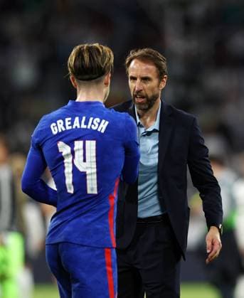 Munich, Germany, 7th June 2022. Gareth Southgate manager of England with Jack Grealish of England during the UEFA Nations League match at Allianz Arena, Munich. Picture credit should read: David Klein Sportimage EDITORIAL USE ONLY. No use with unauthorised audio, video, data, fixture lists, club league logos or live services. Online in-match use limited to 120 images, no video emulation. No use in betting, games or single club league player publications. SPI-1728-0246