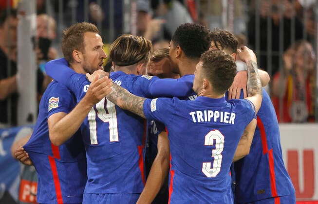 (220608) -- MUNICH, June 8, 2022 -- England s Harry Kane (1st L) celebrates his goal with teammates during the UEFA Nations League A football match between Germany and England at the Allianz Arena in Munich, Germany on June 7, 2022. (Photo by Philippe Ruiz Xinhua) (SP)GERMANY-MUNICH-FOOTBALL-UEFA NATIONS LEAGUE-GERMANY VS ENGLAND FeixLipu¡¤luyizi 