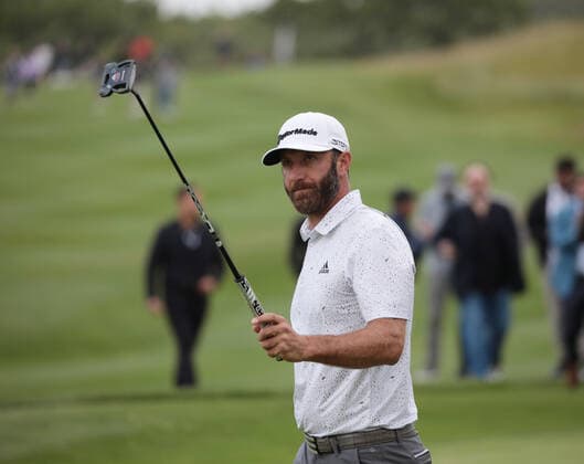 American Dustin Johnson on the 18th green during the first round of the inaugural LIV Golf event at the Centurion club in Hertfordshire on Thurssday, June 09, 2022.The event is 12 teams of four players competing over 54 holes for a prize pot of $25million dollars to the winning team.  LON2022060937 HUGOxPHILPOTT