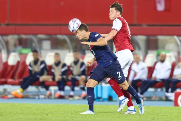 SOCCER - NL, AUT vs FRA VIENNA,AUSTRIA,10.JUN.22 - SOCCER - UEFA Nations League, OEFB international match, Länderspiel, Nationalmannschaft Austria vs France. Image shows Benjamin Pavard (FRA) and Michael Gregoritsch (AUT).  GEPAxpictures xArminxRauthner