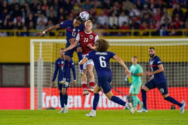 SOCCER - NL, AUT vs FRA VIENNA,AUSTRIA,10.JUN.22 - SOCCER - UEFA Nations League, OEFB international match, Länderspiel, Nationalmannschaft Austria vs France. Image shows Christopher Nkunku (FRA) and Xaver Schlager (AUT).  GEPAxpictures xJohannesxFriedl