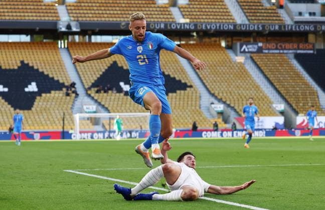 Wolverhampton, England, 11th June 2022. Declan Rice of England tackles Davide Frattesi of Italy during the UEFA Nations League match at Molineux, Wolverhampton. Picture credit should read: Darren Staples Sportimage EDITORIAL USE ONLY. No use with unauthorised audio, video, data, fixture lists, club league logos or live services. Online in-match use limited to 120 images, no video emulation. No use in betting, games or single club league player publications. SPI-1732-0044