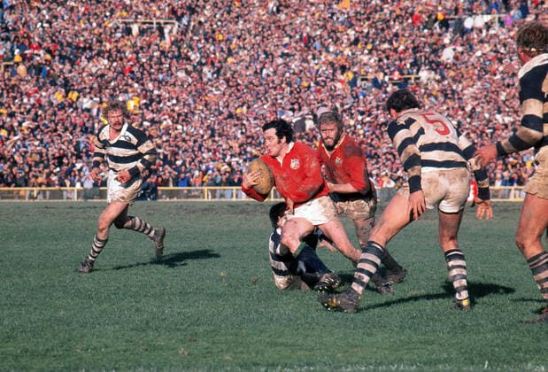 Rugby Union - 1977 British Lions Tour to New Zealand - Auckland 15 British Lions 34 Phil Bennett of the Lions makes a break for a try at Eden Park, Auckland. 