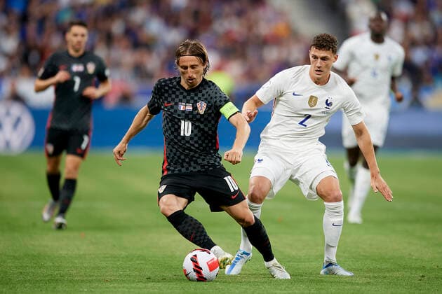 France v Croatia: UEFA Nations League - League Path Group 1 Luka Modric (Real Madrid) of Croatia and Benjamin Pavard (Bayern Munich) of France compete for the ball during the UEFA Nations League League A Group 1 match between France and Croatia at Stade de France on June 13, 2022 in Paris, France. Paris France  Copyright: xJosexBretonx originalFilename:breton-francevc220613_npLSu.jpg
