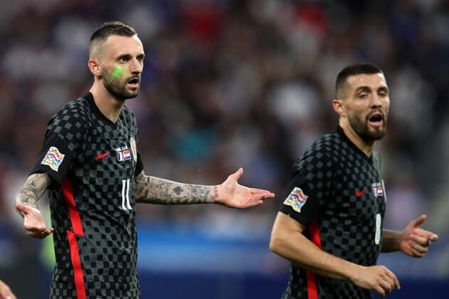 Football - 2022 2023 UEFA Nations League - League A - Group C - France vs Croatia - Stade de France - Monday 13th June 2013 A laser pen lights up the face of Marcelo Brozovic of Croatia 