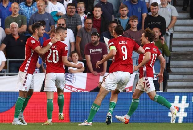 Wolverhampton, England, 14th June 2022. Roland Sallai of Hungary celebrates scoring the first goal during the UEFA Nations League match at Molineux, Wolverhampton. Picture credit should read: Darren Staples Sportimage EDITORIAL USE ONLY. No use with unauthorised audio, video, data, fixture lists, club league logos or live services. Online in-match use limited to 120 images, no video emulation. No use in betting, games or single club league player publications. SPI-1734-0035