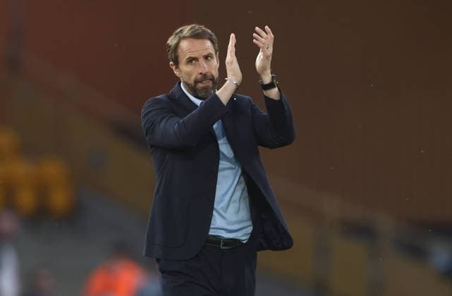 Wolverhampton, England, 14th June 2022. Gareth Southgate manager of England reacts to the fans during the UEFA Nations League match at Molineux, Wolverhampton. Picture credit should read: Darren Staples Sportimage EDITORIAL USE ONLY. No use with unauthorised audio, video, data, fixture lists, club league logos or live services. Online in-match use limited to 120 images, no video emulation. No use in betting, games or single club league player publications. SPI-1734-0088