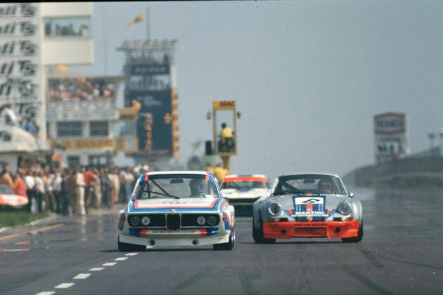 auf der Start- und Ziel-Geraden bei 1000Km-Rennen 1973 auf dem Nürburgring der BMW 3.0CSL von Hezemans + uester und der Ford Capri RS von Birrell+Fitzpatrick sowie der Martini-Porsche RSR von van Lennep + Müller im Gesamtklassement des Rennens kam der Porsche auf Platz 4 und der Ford auf Platz 6 und der BMW auf Platz 9 *** on the start and finish straight at 1000Km race 1973 at the Nürburgring the BMW 3 0CSL of Hezemans uester and the Ford Capri RS of Birrell Fitzpatrick and the Martini Porsche RSR of van Lennep Müller in the overall classification of the race the Porsche came on 4th place and the Ford on 6th place and the BMW on 9th place