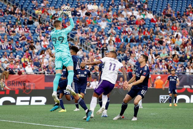 FOXBOROUGH, MA - JUNE 15: New England Revolution goalkeeper Djordje Petrovic (98) rises to grab a cross during a match between the New England Revolution and Orlando City SC on June 15, 2022, at Gillette Stadium in Foxborough, Massachusetts. (Photo by Fred Kfoury III Icon Sportswire) SOCCER: JUN 15 MLS, Fussball Herren, USA - Orlando City SC at New England Revolution Icon482220615004
