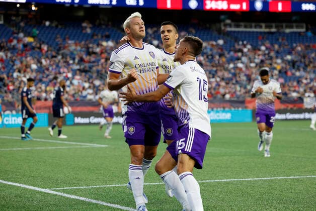 FOXBOROUGH, MA - JUNE 15: Orlando City SC defender Robin Jansson (6) mobbed after his strike during a match between the New England Revolution and Orlando City SC on June 15, 2022, at Gillette Stadium in Foxborough, Massachusetts. (Photo by Fred Kfoury III Icon Sportswire) SOCCER: JUN 15 MLS, Fussball Herren, USA - Orlando City SC at New England Revolution Icon482220615027