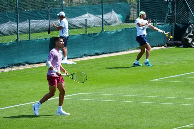 Mandatory Credit: Photo by Javier Garcia Shutterstock (12994278t) Carlos Alcaraz training next to Rafael Nadal Wimbledon Tennis Championship Practice and Previews, The All England Lawn Tennis and Croquet Club, London, UK - 21 Jun 2022 Wimbledon Tennis Championship Practice and Previews, The All England Lawn Tennis and Croquet Club, London, UK - 21 Jun 2022  Copyright: xJavierxGarcia Shutterstockx 12994278t