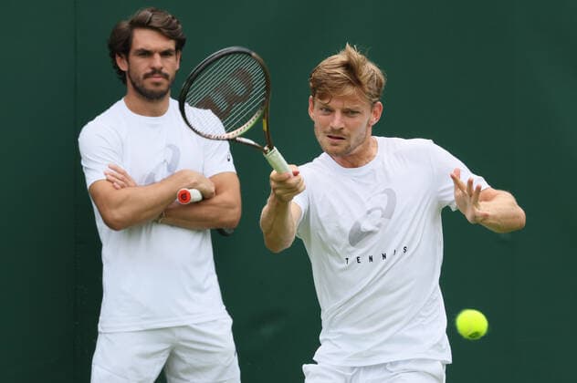 Belgian David Goffin and Goffin s coach Germain Gigounon pictured during a training session ahead of the 2022 Wimbledon grand slam tennis tournament at the All England Tennis Club, in south-west London, Britain, Friday 24 June 2022. BENOITxDOPPAGNE  x36598684x