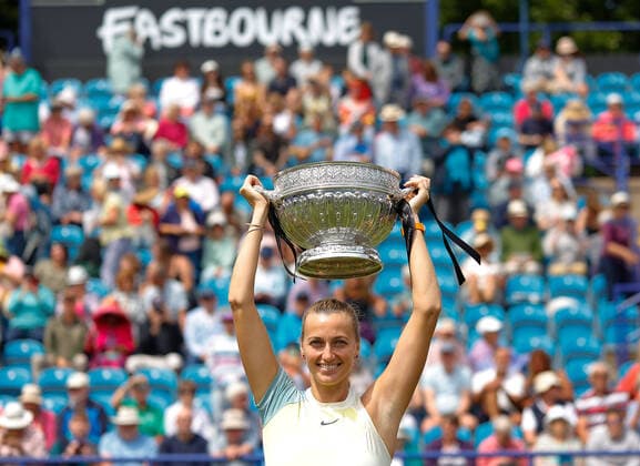 25th June 2022, Devonshire Park, Eastbourne, England; Eastbourne International Lawn Tennis Tournament finals; Petra Kvitova (CZE) celebrates with the winner& x2019;s trophy after the womens singles final  ActionPlus12402330 HongboxChen