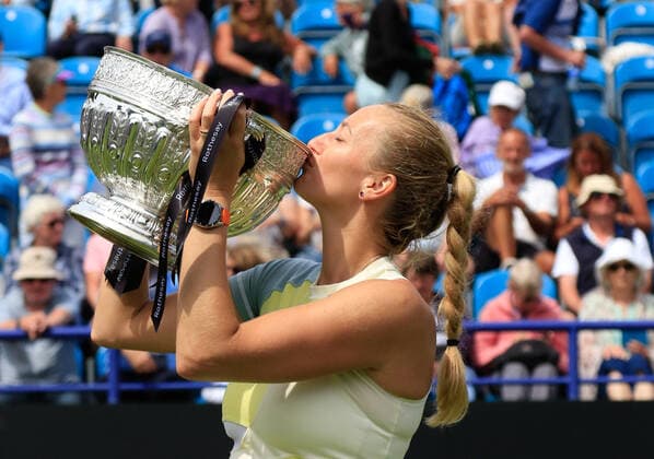 25th June 2022, Devonshire Park, Eastbourne, England; Eastbourne International Lawn Tennis Tournament finals; Petra Kvitova (CZE) celebrates with the winner& x2019;s trophy after the womens singles final  ActionPlus12402339 HongboxChen