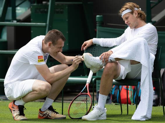 Sports Psychologist Gert Jan De Muynck and Belgian Zizou Bergs pictured during a training session ahead of the 2022 Wimbledon grand slam tennis tournament at the All England Tennis Club, in south-west London, Britain, Saturday 25 June 2022. BENOITxDOPPAGNE  x36631702x