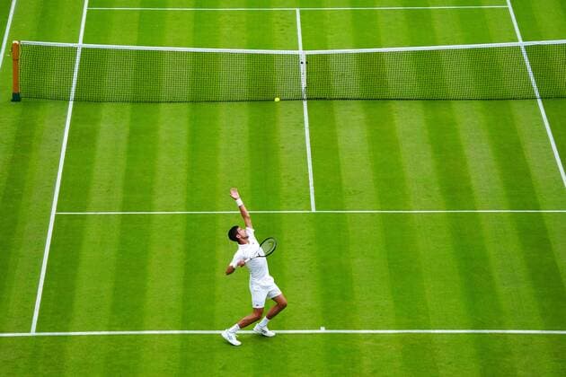 Mandatory Credit: Photo by Javier Garcia Shutterstock (13002017t) Novak Djokovic serving during his first round match Wimbledon Tennis Championships, Day 1, The All England Lawn Tennis and Croquet Club, London, UK - 27 Jun 2022 Wimbledon Tennis Championships, Day 1, The All England Lawn Tennis and Croquet Club, London, UK - 27 Jun 2022  Copyright: xJavierxGarcia Shutterstockx 13002017t