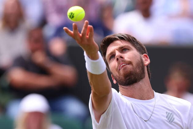27th June 2022, All England Lawn Tennis and Croquet Club, London, England; Wimbledon Tennis tournament; Cameron Norrie serves to Pablo Andujar in the mens singles  ActionPlus12402574 ShaunxBrooks