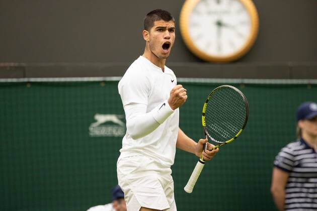 Mandatory Credit: Photo by Ella Ling Shutterstock (13002016ag) Carlos Alcaraz during his first round match Wimbledon Tennis Championships, Day 1, The All England Lawn Tennis and Croquet Club, London, UK - 27 Jun 2022 Wimbledon Tennis Championships, Day 1, The All England Lawn Tennis and Croquet Club, London, UK - 27 Jun 2022  Copyright: xEllaxLing Shutterstockx 13002016ag