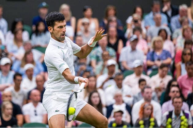 220627 Novak Djokovic of Serbia competes in a first round singles tennis match during day 1 of Wimbledon on June 27, 2022 in London. Photo: Mathias Bergeld BILDBYRAN kod MB MB0412 tennis wimbledon day 1 bbeng serbien serbia Copyright: MATHIASxBERGELD BB220627MB062