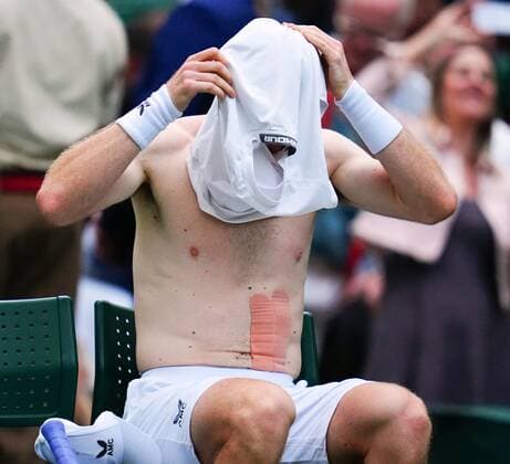Mandatory Credit: Photo by Javier Garcia Shutterstock (13002017hn) Andy Murray changes his shirt during his first round match Wimbledon Tennis Championships, Day 1, The All England Lawn Tennis and Croquet Club, London, UK - 27 Jun 2022 Wimbledon Tennis Championships, Day 1, The All England Lawn Tennis and Croquet Club, London, UK - 27 Jun 2022  Copyright: xJavierxGarcia Shutterstockx 13002017hn