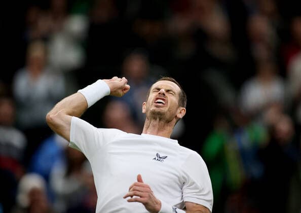 (220628) -- LONDON, June 28, 2022 -- Andy Murray celebrates after winning the men s singles first round match between Andy Murray of Britain and James Duckworth of Australia at Wimbledon Tennis Championship in London, Britain, on June 27, 2022. ) (SP)BRITAIN-LONDON-TENNIS-WIMBLEDON-DAY 1 LixYing 