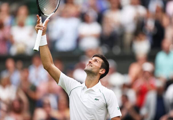 (220628) -- LONDON, June 28, 2022 -- Novak Djokovic celebrates after winning the men s singles first round match between Novak Djokovic of Serbia and Kwon Soonwoo of South Korea at Wimbledon Tennis Championship in London, Britain, on June 27, 2022. ) (SP)BRITAIN-LONDON-TENNIS-WIMBLEDON-DAY 1 LixYing 
