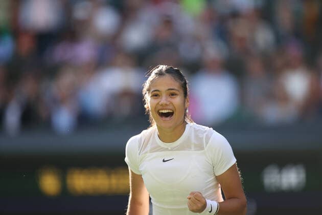 (220628) -- LONDON, June 28, 2022 -- Emma Raducanu celebrates after winning the women s singles first round match between Emma Raducanu of Britain and Alison Van Uytvanck of Belgium at Wimbledon Tennis Championship in London, Britain, on June 27, 2022. ) (SP)BRITAIN-LONDON-TENNIS-WIMBLEDON-DAY 1 LixYing 