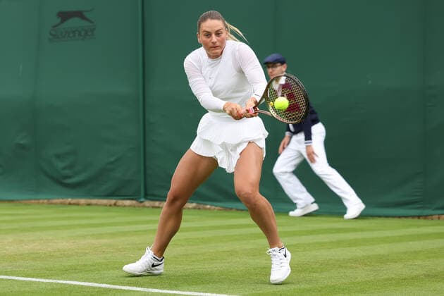 28th June 2022, All England Lawn Tennis and Croquet Club, London, England; Wimbledon Tennis tournament; Marta Kostyuk plays a backhand to Katie Swan  ActionPlus12402679 ShaunxBrooks