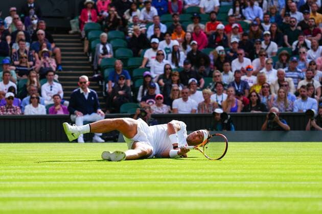 Mandatory Credit: Photo by Javier Garcia Shutterstock (13002021gg) Rafael Nadal slips over during his first round match Wimbledon Tennis Championships, Day 2, The All England Lawn Tennis and Croquet Club, London, UK - 28 Jun 2022 Wimbledon Tennis Championships, Day 2, The All England Lawn Tennis and Croquet Club, London, UK - 28 Jun 2022  Copyright: xJavierxGarcia Shutterstockx 13002021gg