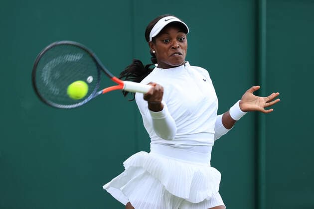 Tennis - Wimbledon (Day 2) 28th June 2022 - Tennis - Wimbledon (Day 2) - Sloane Stephens (USA) in action against Qinwen Zheng (CHN) in their Ladies Singles 1st Round match - Photo: Simon Stacpoole Offside. London UK Copyright: xSimonxStacpoolexOffside